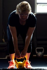 Older women lifting kettlebell Scotland All-Strong Perth Fitness Classes
